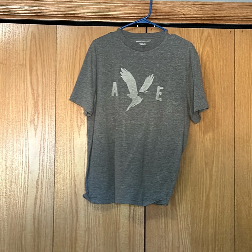 This shirt has been worn once.It is super soft and standard fit.